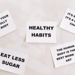 Collection of motivational cards promoting healthy habits and lifestyle on a minimalistic white background.